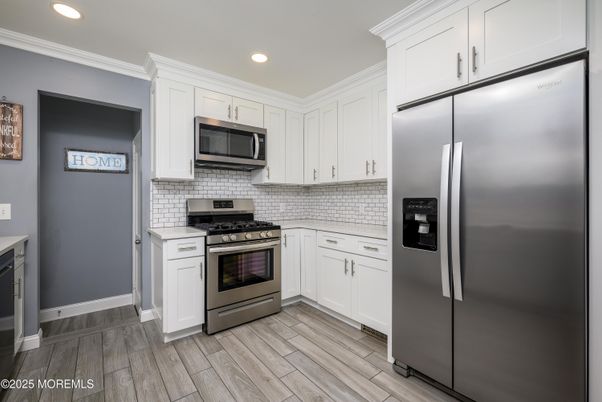 Interior, Kitchen, Recessed Lighting, Stainless Steel Appliances, Wood Texture Flooring