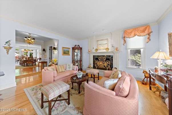Chandelier, Dining room, Fireplace, Interior, Living room, Recessed Lighting, Wood Texture Flooring