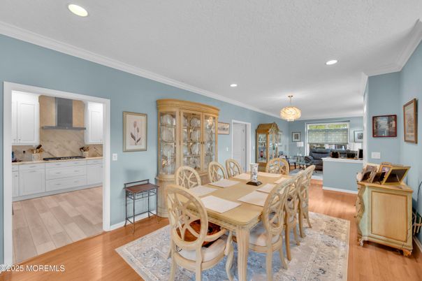 Chandelier, Dining room, Interior, Kitchen, Living room, Recessed Lighting, Wood Texture Flooring