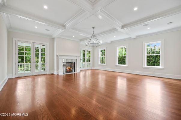 Chandelier, Empty room, Fireplace, Interior, Recessed Lighting, Wood Texture Flooring