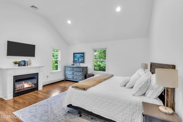 Bedroom, Fireplace, Interior, Recessed Lighting, Wood Texture Flooring