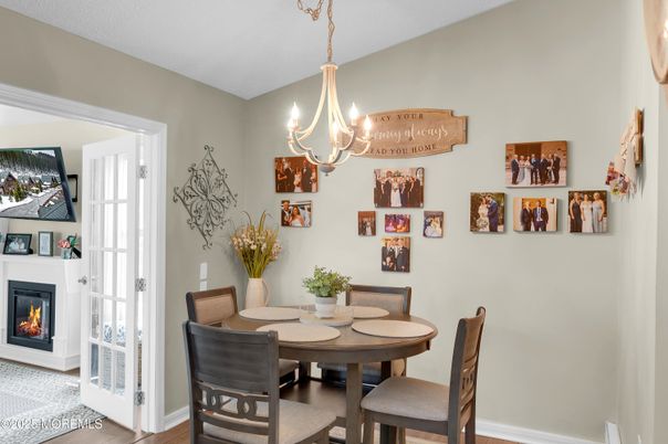 Chandelier, Dining room, Fireplace, Interior, Wood Texture Flooring