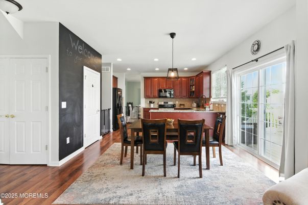 Dining room, Interior, Kitchen, Pendant Lights, Recessed Lighting, Stainless Steel Appliances, Wood Texture Flooring