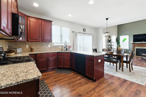 Dining room, Fireplace, Interior, Kitchen, Pendant Lights, Recessed Lighting, Wood Texture Flooring