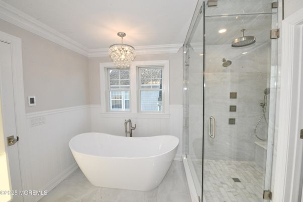Bathroom, Chandelier, Free Standing Baths, Glass Shower, Interior, Recessed Lighting