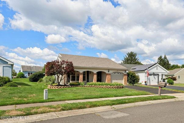 Attached, Exterior, Facade, Brick Facade, Solar Panels, Ranch