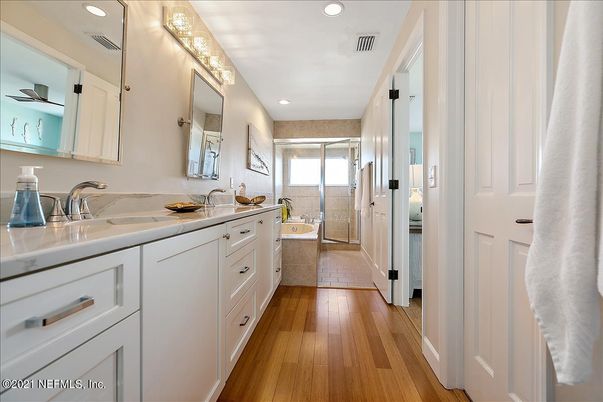 Bathroom, Dual Sink Vanities, Interior, Recessed Lighting, Wood Texture Flooring