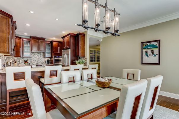 Dining room, Interior, Kitchen, Pendant Lights, Recessed Lighting, Stainless Steel Appliances, Wood Texture Flooring