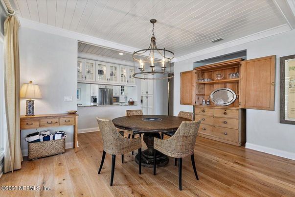 Chandelier, Dining room, Interior, Kitchen, Pendant Lights, Recessed Lighting, Stainless Steel Appliances, Wood Texture Flooring
