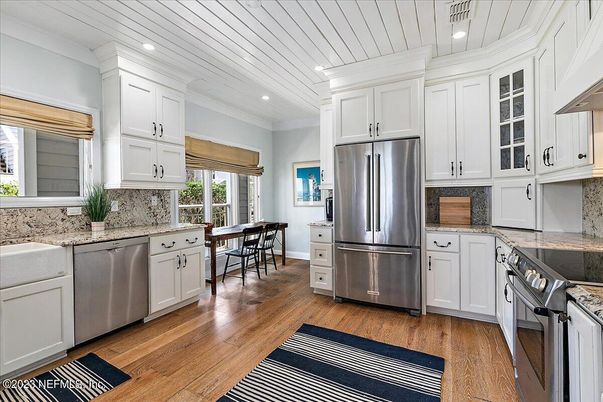 Dining room, Interior, Kitchen, Recessed Lighting, Stainless Steel Appliances, Wood Texture Flooring