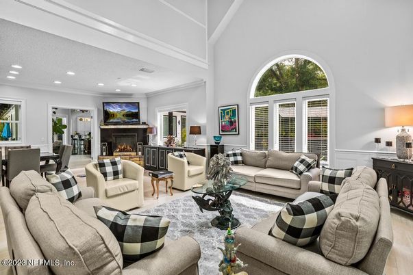 Dining room, Fireplace, Interior, Living room, Recessed Lighting, Wood Texture Flooring