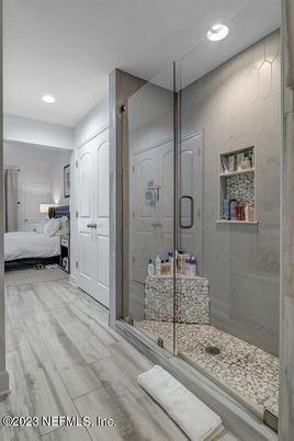 Bathroom, Bedroom, Glass Shower, Interior, Recessed Lighting, Wood Texture Flooring
