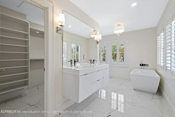 Bathroom, Dual Sink Vanities, Free Standing Baths, Interior, Marble, Recessed Lighting, Walk-in Closets