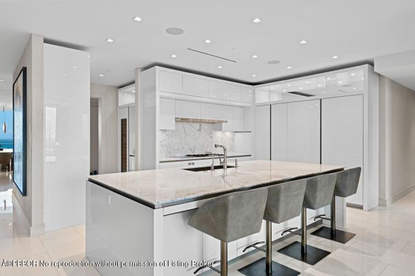 Interior, Kitchen, Marble Walls, Recessed Lighting, Stainless Steel Appliances