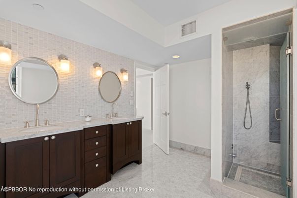 Bathroom, Dual Sink Vanities, Glass Shower, Interior, Marble Walls, Recessed Lighting