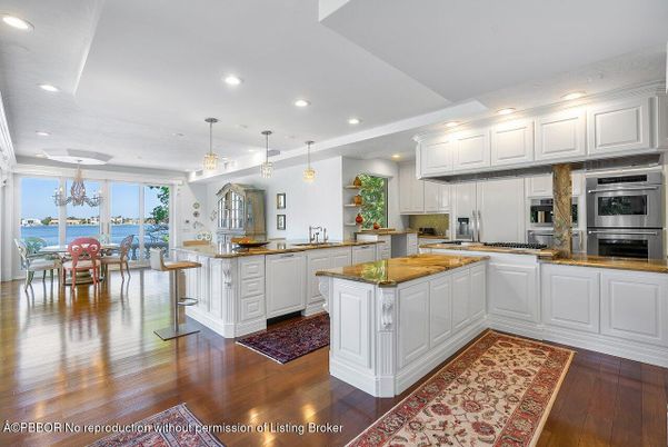 Dining room, Interior, Kitchen, Pendant Lights, Recessed Lighting, Stainless Steel Appliances, Water, Wood Texture Flooring
