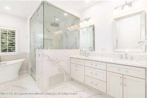 Bathroom, Dual Sink Vanities, Free Standing Baths, Glass Shower, Interior, Marble, Marble Walls, Recessed Lighting