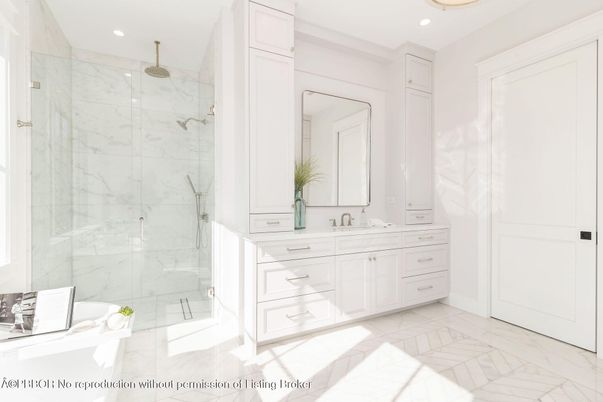 Bathroom, Dual Sink Vanities, Glass Shower, Interior, Marble, Marble Walls, Recessed Lighting