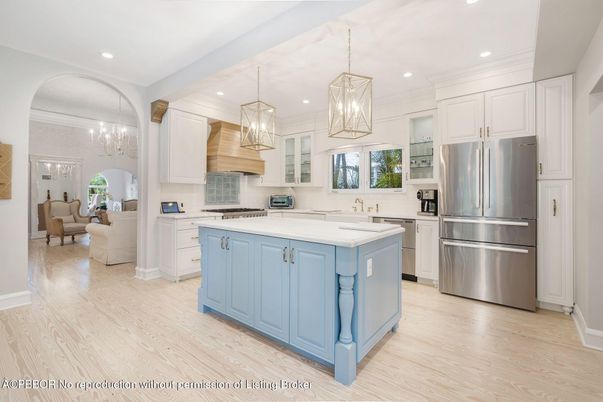 Chandelier, Interior, Kitchen, Living room, Pendant Lights, Recessed Lighting, Stainless Steel Appliances, Wood Texture Flooring