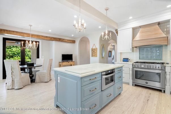 Chandelier, Dining room, Interior, Kitchen, Pendant Lights, Recessed Lighting, Stainless Steel Appliances, Wood Texture Flooring