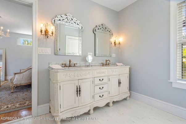 Bathroom, Chandelier, Dual Sink Vanities, Interior, Wood Texture Flooring
