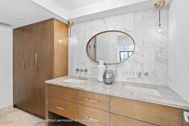 Bathroom, Dual Sink Vanities, Interior, Marble Walls, Pendant Lights, Recessed Lighting