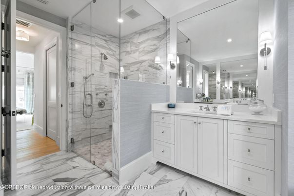 Bathroom, Dual Sink Vanities, Glass Shower, Interior, Marble, Marble Walls, Recessed Lighting