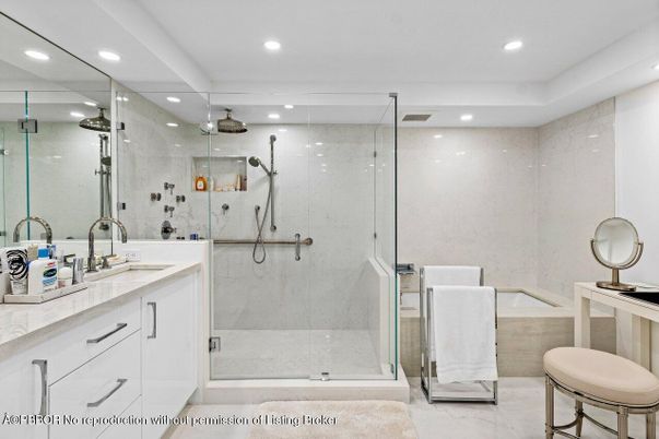 Bathroom, Dual Sink Vanities, Glass Shower, Interior, Marble, Marble Walls, Recessed Lighting