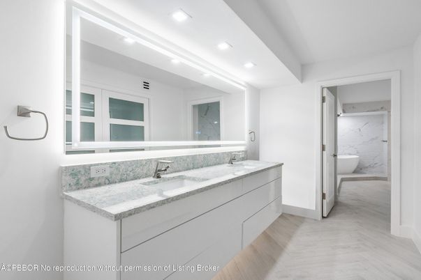 Bathroom, Dual Sink Vanities, Free Standing Baths, Interior, Marble Walls, Recessed Lighting, Wood Texture Flooring