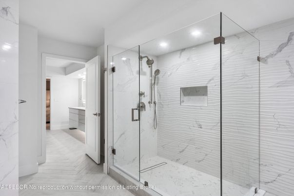Bathroom, Glass Shower, Interior, Marble Walls, Recessed Lighting, Wood Texture Flooring