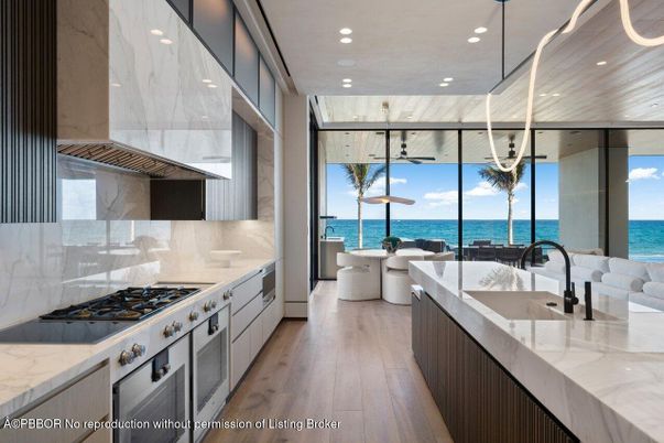 Interior, Kitchen, Marble Walls, Recessed Lighting, Stainless Steel Appliances, Water, Wood Texture Flooring