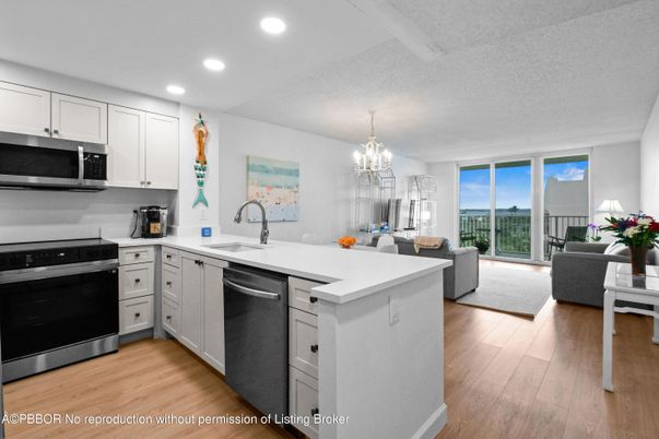 Chandelier, Interior, Kitchen, Living room, Recessed Lighting, Stainless Steel Appliances, Wood Texture Flooring