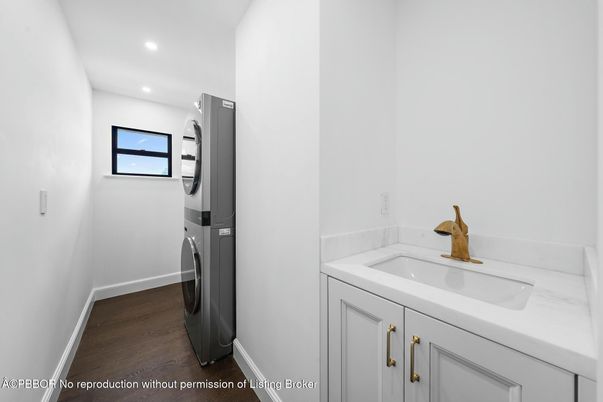 Bathroom, Interior, Recessed Lighting, Washer, Wood Texture Flooring