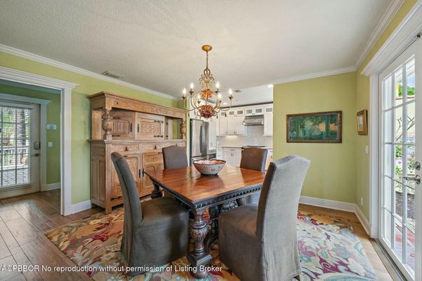 Chandelier, Dining room, Interior, Kitchen, Stainless Steel Appliances, Wood Texture Flooring
