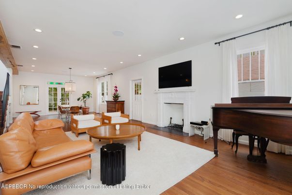 Fireplace, Interior, Living room, Pendant Lights, Piano, Recessed Lighting, Wood Texture Flooring
