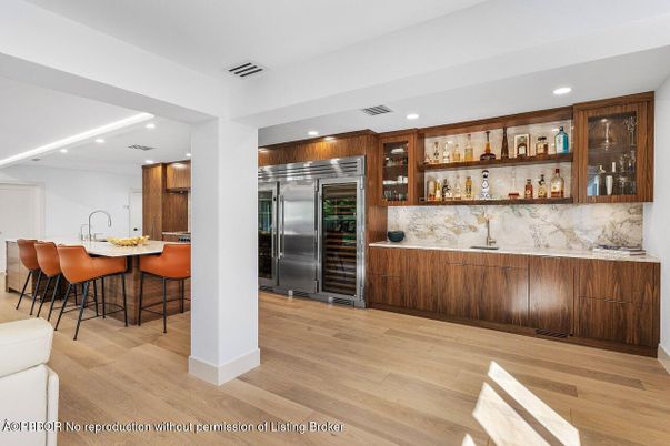 Interior, Kitchen, Marble Walls, Recessed Lighting, Stainless Steel Appliances, Wood Texture Flooring