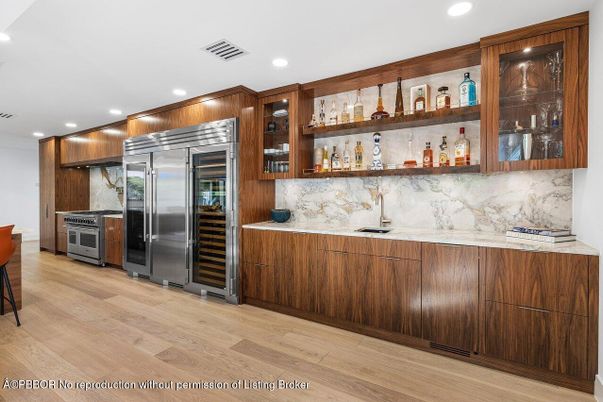 Interior, Kitchen, Marble Walls, Recessed Lighting, Stainless Steel Appliances, Wood Texture Flooring