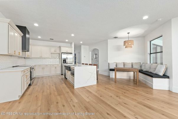 Chandelier, Interior, Kitchen, Recessed Lighting, Stainless Steel Appliances, Wood Texture Flooring