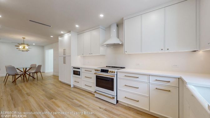Dining room, Interior, Kitchen, Recessed Lighting, Stainless Steel Appliances, Wood Texture Flooring