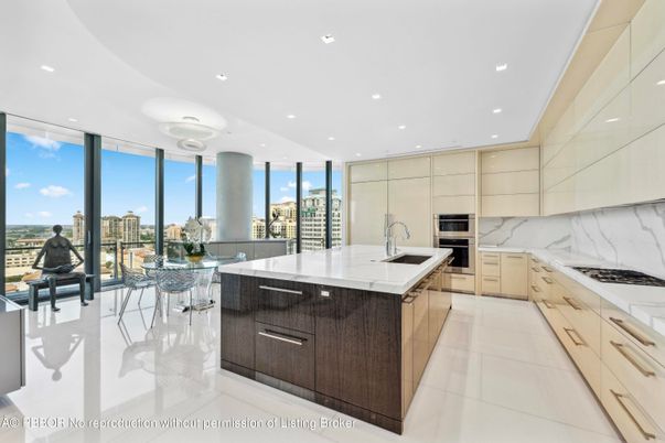 Interior, Kitchen, Marble Walls, Recessed Lighting, Stainless Steel Appliances