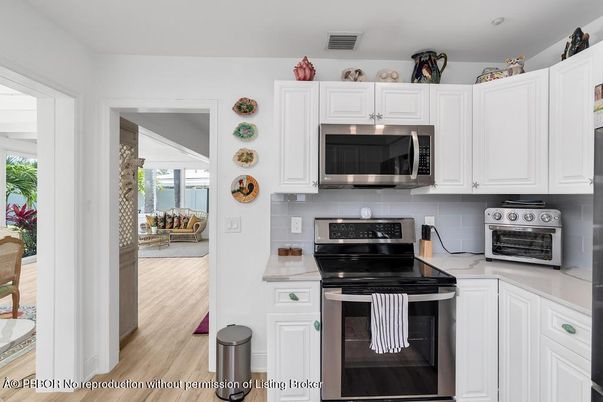 Interior, Kitchen, Stainless Steel Appliances, Water, Wood Texture Flooring