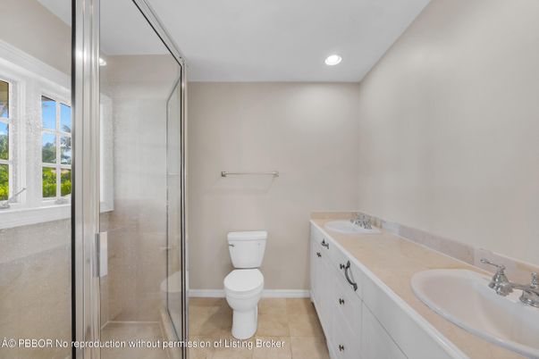 Bathroom, Dual Sink Vanities, Glass Shower, Interior, Recessed Lighting, Tile Countertops
