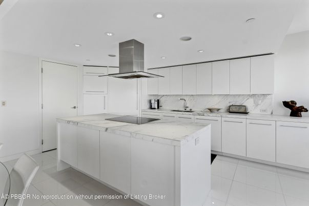 Interior, Kitchen, Marble Walls, Recessed Lighting, Stainless Steel Appliances