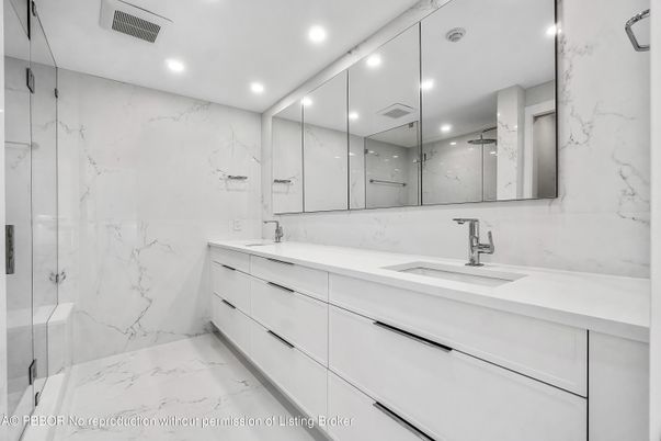 Bathroom, Dual Sink Vanities, Glass Shower, Interior, Marble, Marble Walls, Recessed Lighting