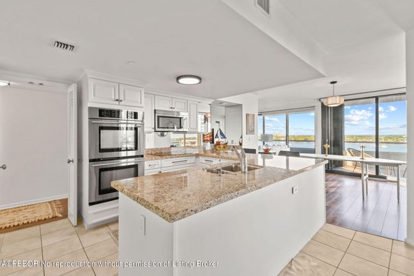Dining room, Interior, Kitchen, Pendant Lights, Stainless Steel Appliances, Water, Wood Texture Flooring