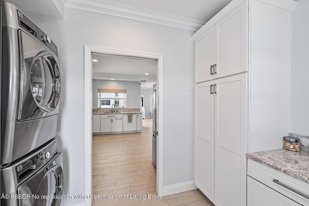 Interior, Kitchen, Recessed Lighting, Washer, Wood Texture Flooring