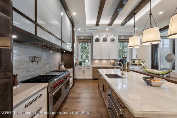 Interior, Kitchen, Marble Walls, Pendant Lights, Recessed Lighting, Stainless Steel Appliances, Wood Texture Flooring