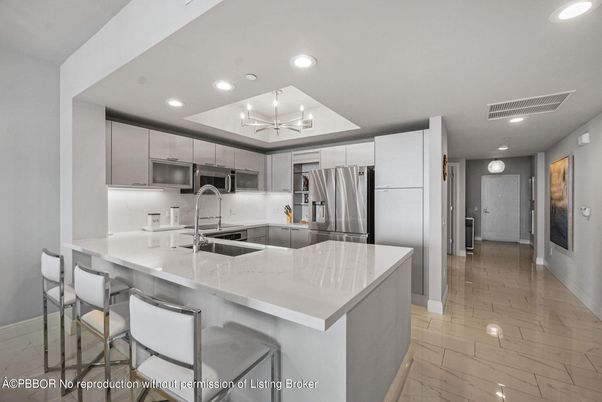 Interior, Kitchen, Marble, Recessed Lighting, Stainless Steel Appliances, Wood Texture Flooring