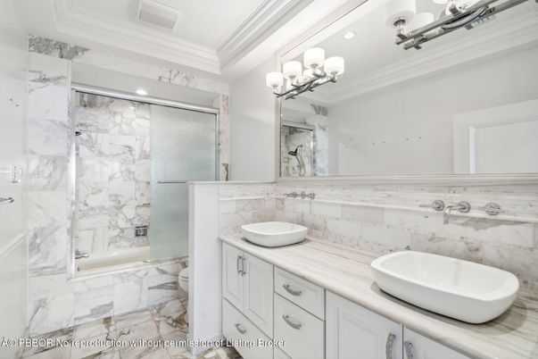 Bathroom, Dual Sink Vanities, Glass Shower, Interior, Marble, Marble Walls, Recessed Lighting