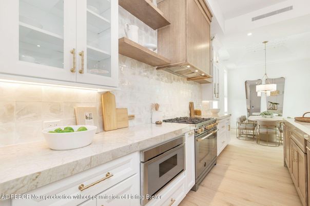 Chandelier, Dining room, Interior, Kitchen, Pendant Lights, Recessed Lighting, Stainless Steel Appliances, Wood Texture Flooring